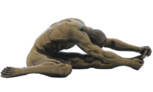 Photo of Stretching Nude Male Figurine