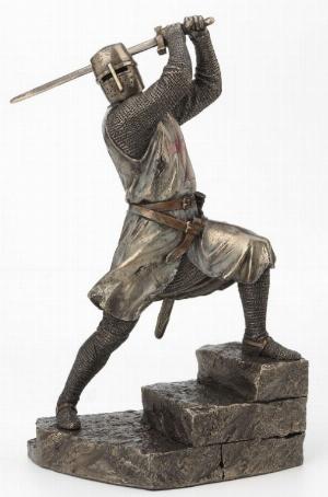 Photo of Knight with Sword Attacking Bronze Figurine