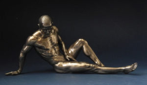 Photo of Resting Nude Male Alone Bronze Figurine