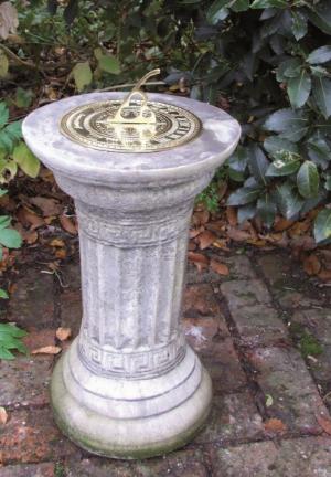 Photo of Small Stone Column with Brass Sundial