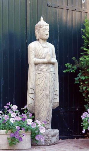 Photo of Standing Buddha Stone Statue