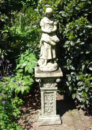 Photo of Peasant Girl Stone Statue