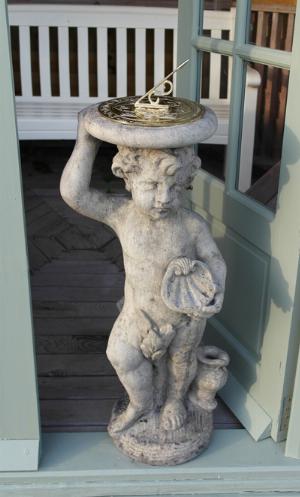 Photo of Stone Cherub with Brass Sundial Plate