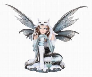 Photo #1 of product D2032F6 - Fae-Lore Winter Fairy Wearing Wolf Hide 30cm
