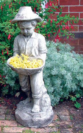 Photo of Swain Boy Stone Statue