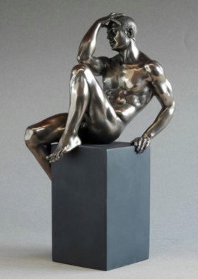 Photo of Nude Male Bronze Figurine on Plinth