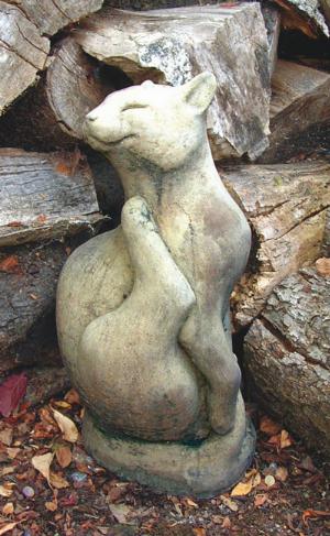 Photo of Scratching Cat Stone Sculpture