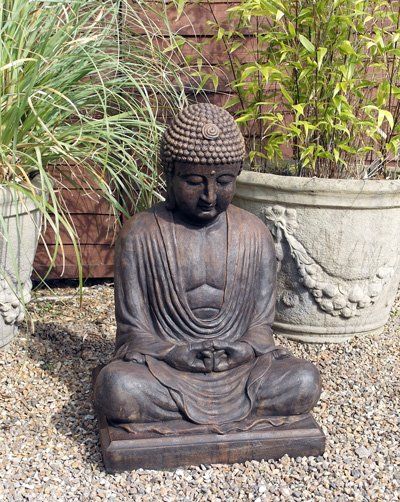 Phot of Meditating Buddha Stone Statue