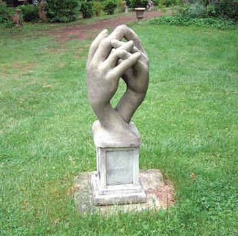Photo of Entwined Hands Stone Sculpture