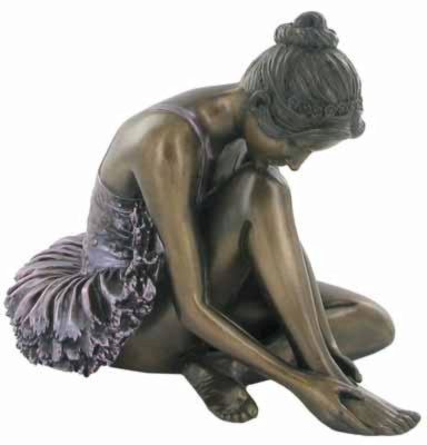 Photo of Ballerina Preparing Bronze Figurine