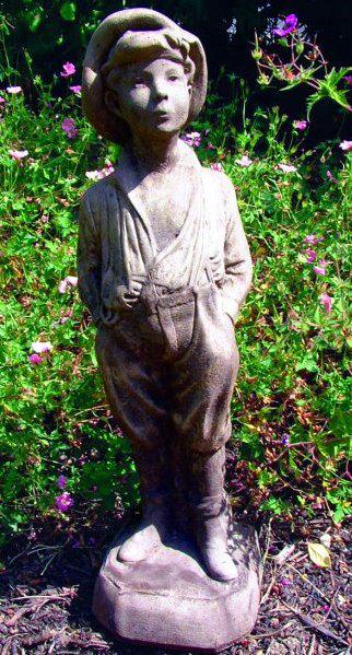 Photo of Whistling Urchin Boy Stone Statue