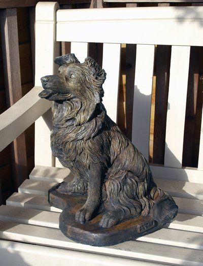 Phot of Collie Pup Dog Stone Statue