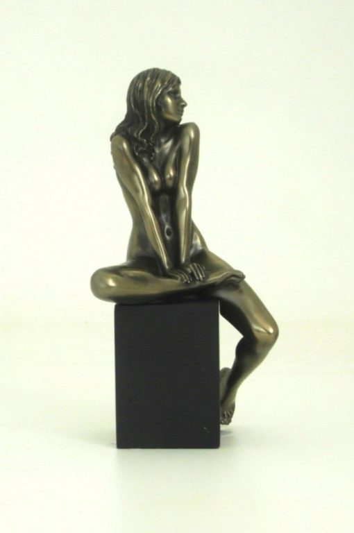 Photo of Nude Girl Sitting on Plinth Leg Up Bronze Figurine