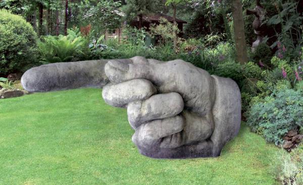 Photo of Pointing Hand Stone Sculpture