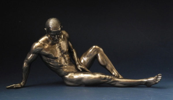 Photo of Resting Nude Male Alone Bronze Figurine