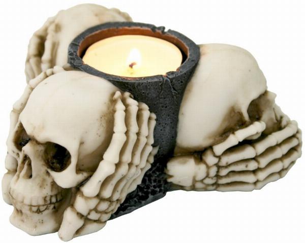 Photo of Three Wise Skulls Tealight Holder