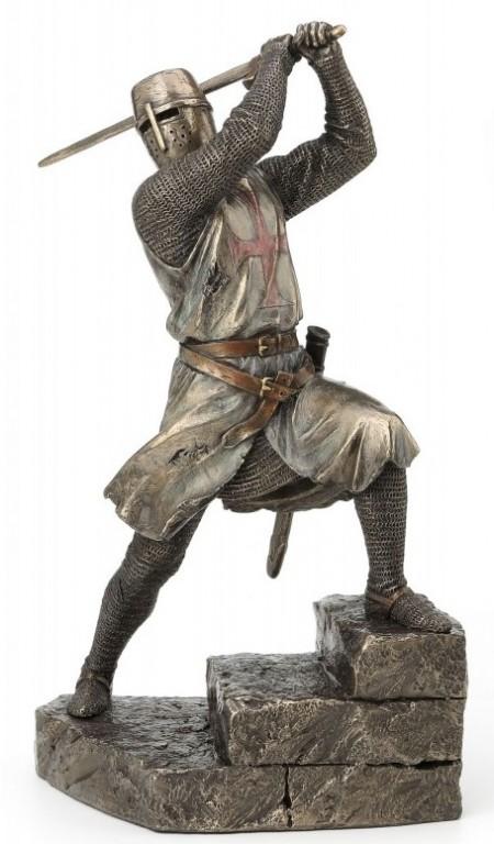 Photo of Knight with Sword Attacking Bronze Figurine