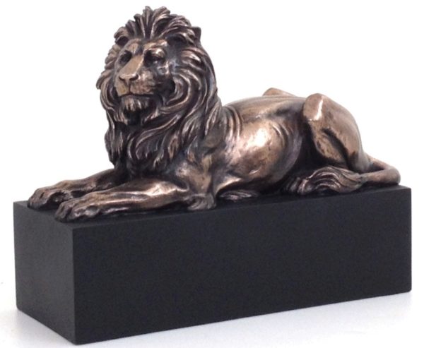 Photo of Lion Bronze Figurine on Black Plinth