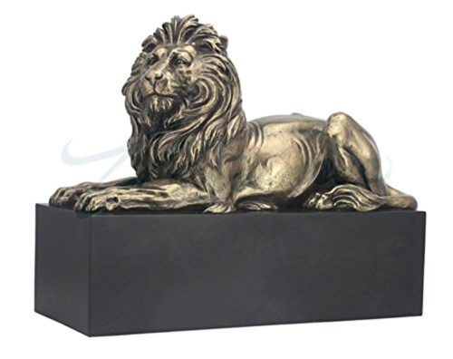 Photo of Lion Bronze Figurine on Black Plinth