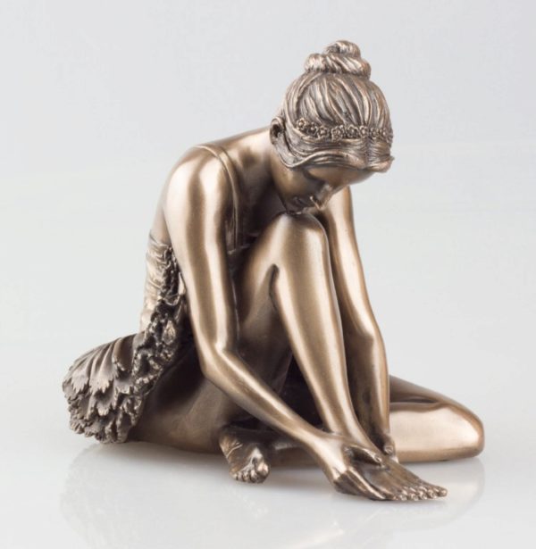 Photo of Ballerina Preparing Bronze Figurine