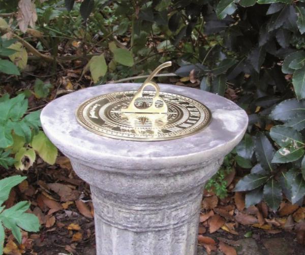 Photo of Roman Stone Column with Brass Sundial